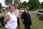 Mom, Norma, and Larry smile for the camera.