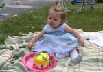 Sam is working up the courage to check out the top layer of her cake.