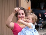 Aunt Katie shows one of the butterflies to the Butterfly.