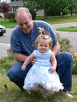 A little Daddy's girl in a little blue dress. 