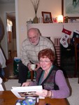 Pop and Poppette look at the calendar of the boys that Mary had made.