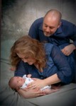 Mom, Dad, and Sammi at two weeks-old