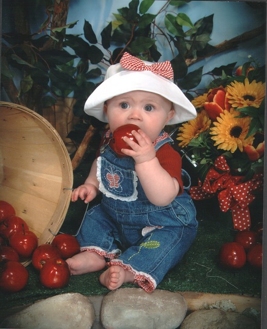 Samantha at six months, tasting the props.