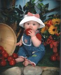 Samantha at six months, tasting the props.