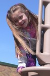 We all enjoyed the endless blue sky and 60 degree day at the playground where Samantha will attend school someday.  And NO, we do NOT make our child wear pads to play at the playground.  She rode her bike there, and the pads are left from the ride.