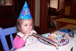 The party horns were a big hit.  All the adults needed migraine medication before they were finally confiscated from the kids.