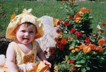 Mommy and Sammi play with the bright flowers they picked out today.  8 months.