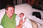 Nana meets Samantha who is wearing one of the dresses that belonged to Michele as a baby.