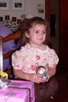 Samantha shows off her snowglobe. . . the very same one that Mama and Da tried to give her for Christmas.  However, the first one broke due to freezing before Sammi ever got to see it.  Oma went back to Jamestown to get a new one.