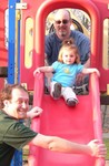 Mom enjoyed having the boys lifting and catching Sam on the slide for a change!