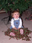 We were very proud of Samantha for not being afraid of the tree that appeared in her living room after her nap.  But as nice as it was, the beads were much more interesting.